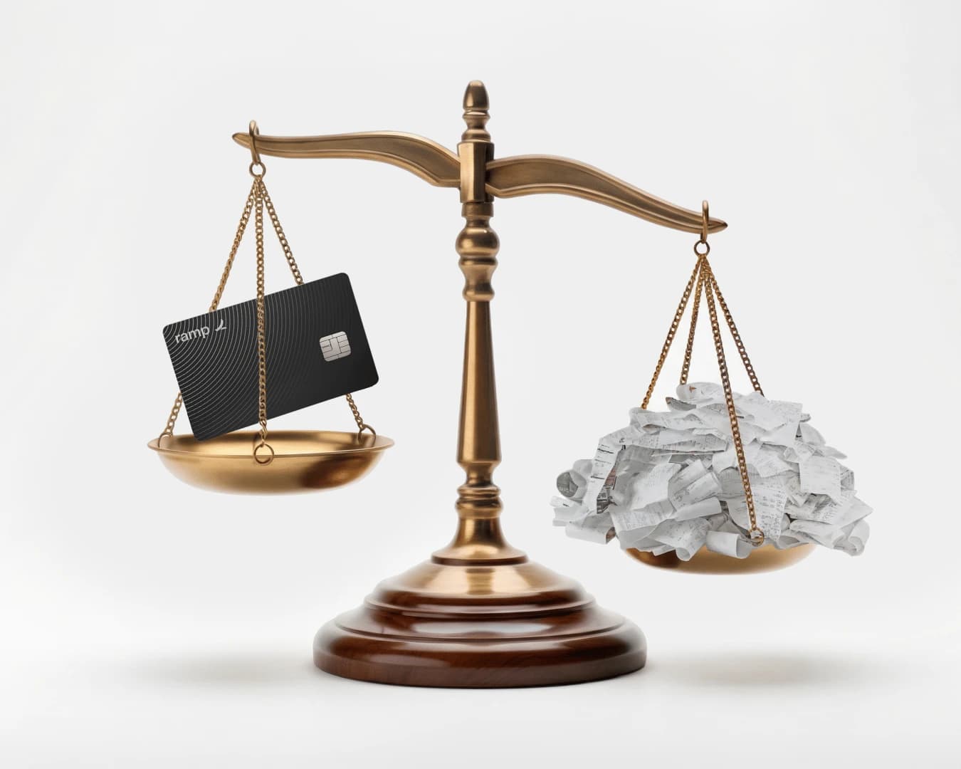 A Ramp card outweighing paperwork on a brass scale.