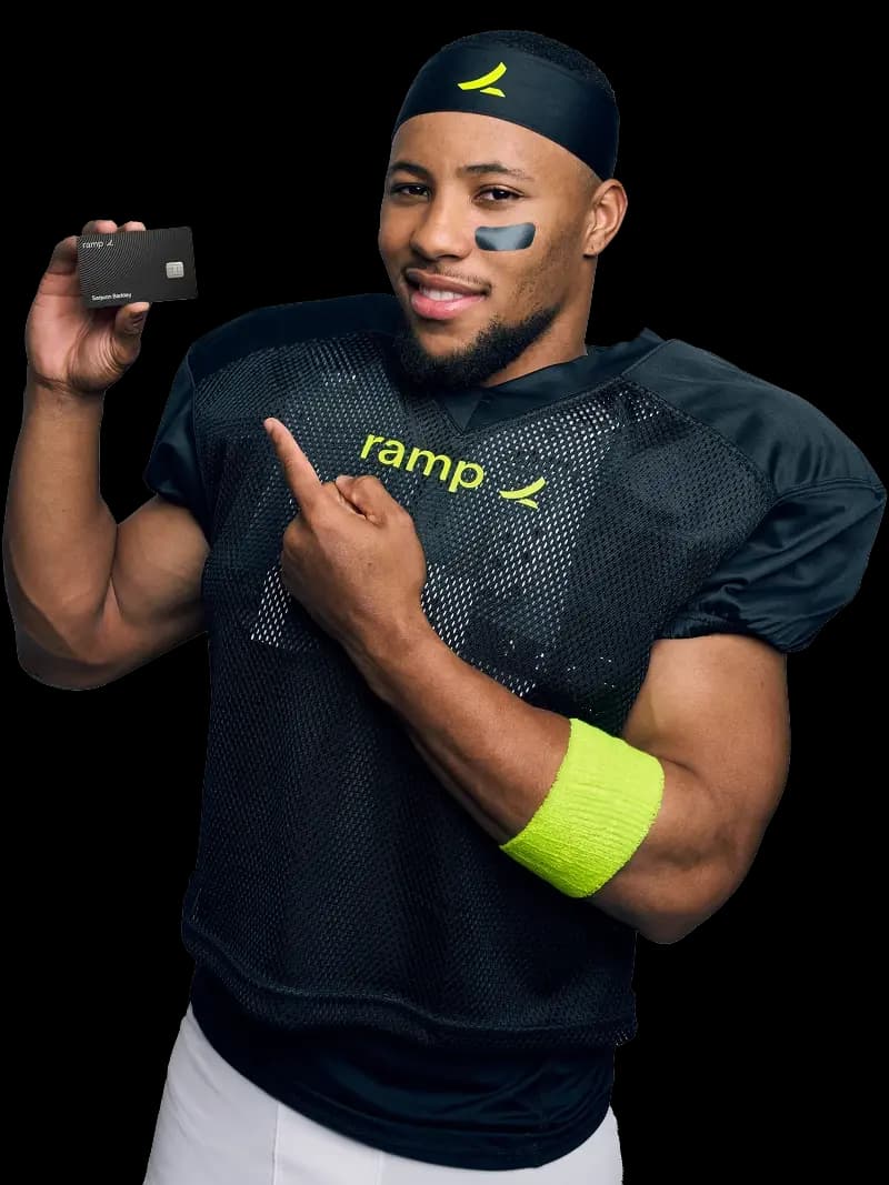Saquon Barkeley holding a Ramp card