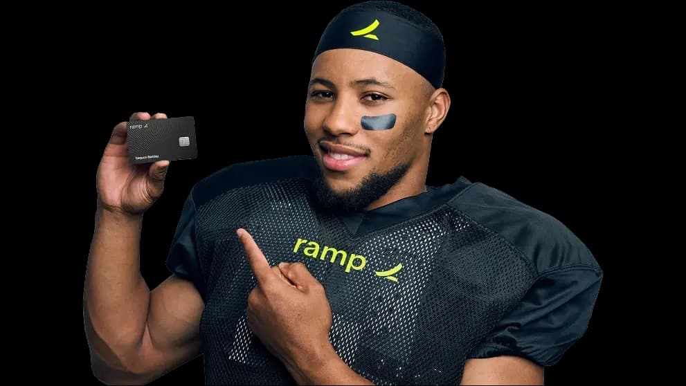 Saquon Barkeley holding a Ramp card