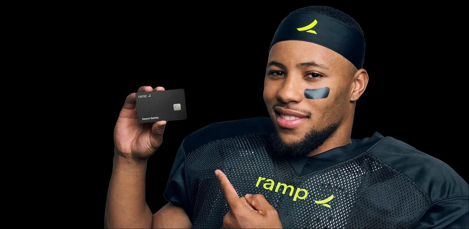 Saquon Barkeley holding a Ramp card